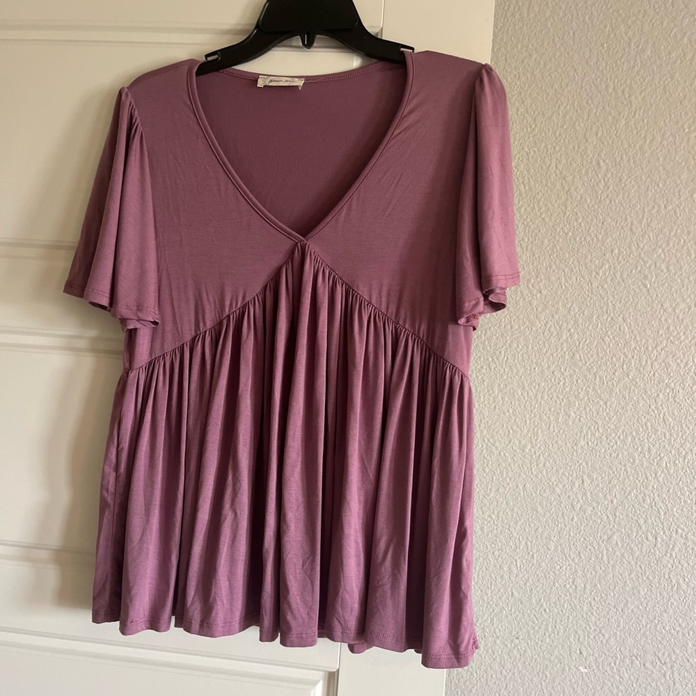 Super cute purple/plum V-neck Flowy top. Size Small.